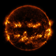 NASA image from October 8th, 2014 show active regions on the Sun that give it a very jack-o’-lantern-like appearance. (Image: NASA/GSFC/SDO)